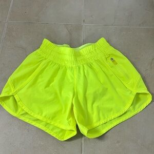Neon yellow lululemon shorts